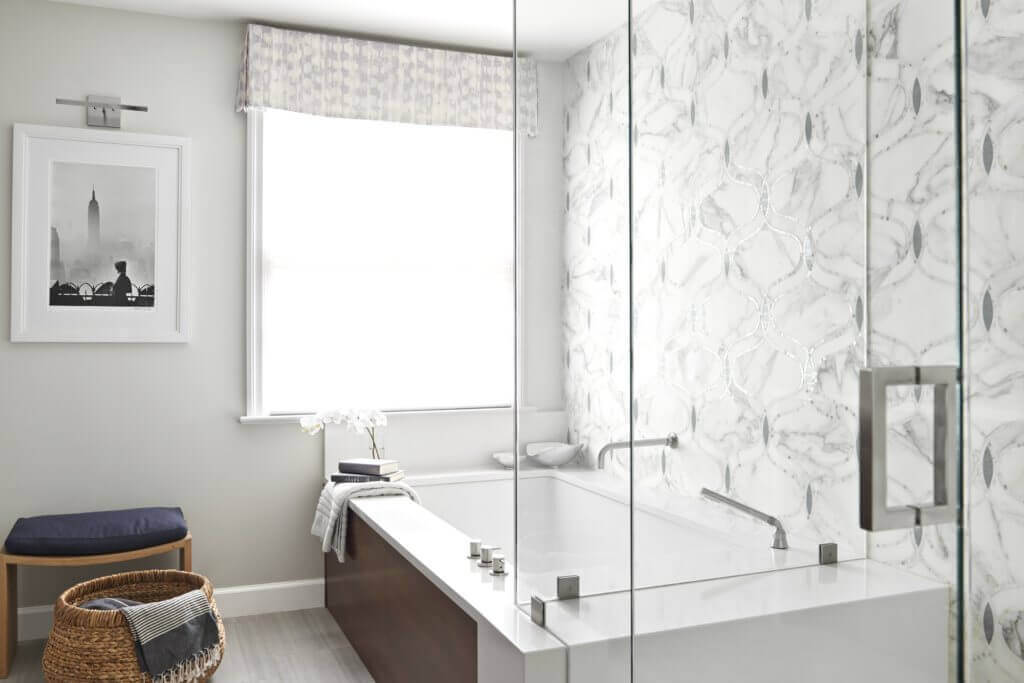 A quartz tub is a stand-out design feature in the master bathroom. 