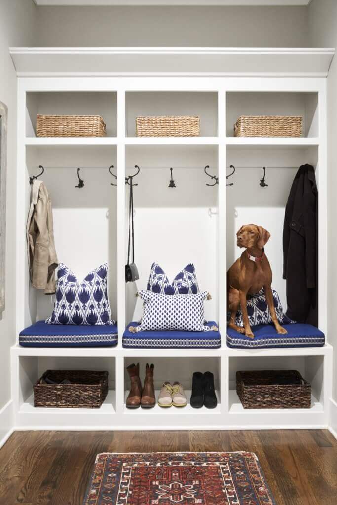 Beth Haley Design | Interior Designer in Nashville hallway with storage and a dog