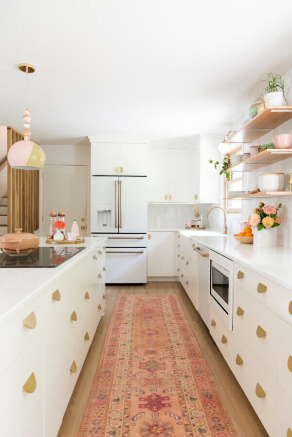 white kitchen with gold accent
