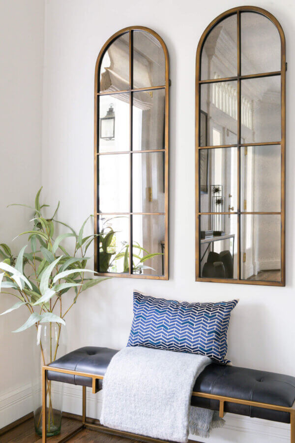 Beth Haley Design | Interior Designer in Nashville hallway with a bench, plant and mirrors